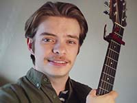 A person holding a guitar  AI-generated content may be incorrect.